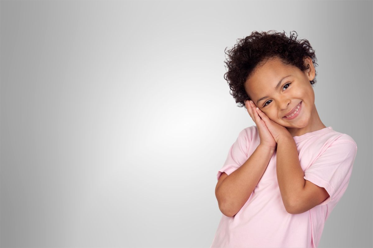 A relaxed, smiling child at the dentist